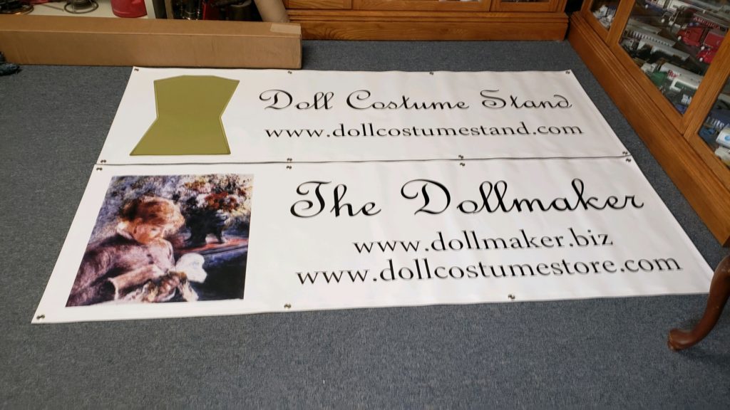 Doll Costume Store Launch Sign