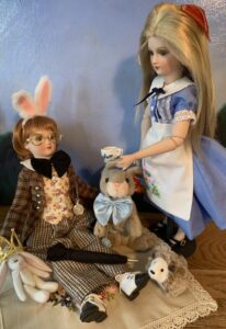 Alice serving the Mad Hatter Tea